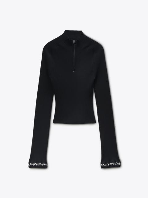 Long-Sleeve Ruffle-Hem Turtleneck