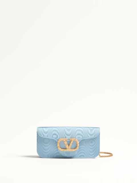 VALENTINO GARAVANI LOCÒ MOIRÉ FABRIC CLUTCH WITH JEWEL LOGO