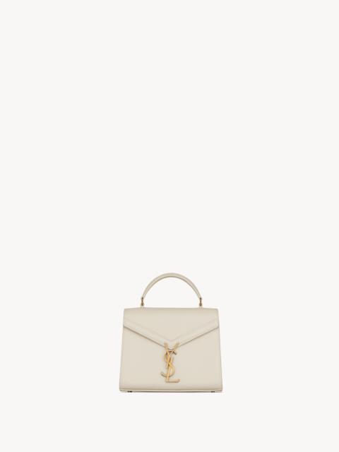 CASSANDRA MINI TOP HANDLE BAG IN GRAIN DE POUDRE EMBOSSED LEATHER