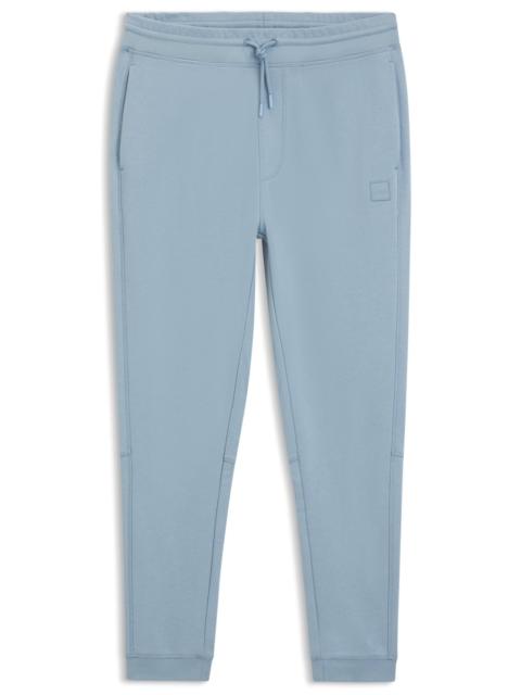 LOGO-PATCH TRACKSUIT BOTTOMS IN COTTON TERRY