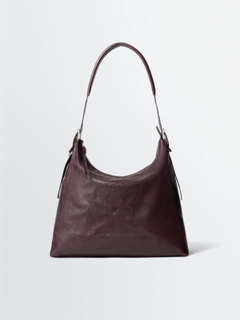 BELTED HOBO BAG IN LEATHER