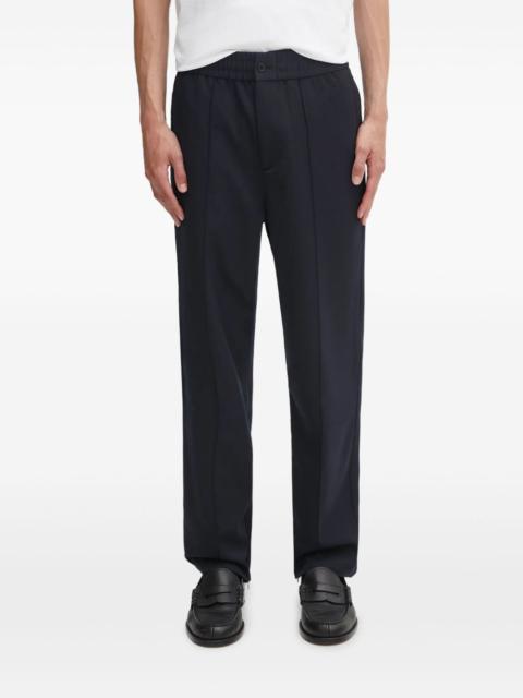 button seam trousers