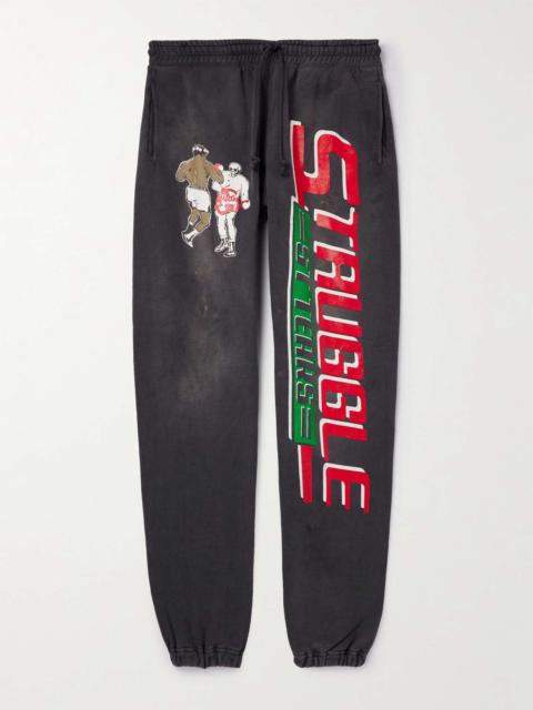 + Denim Tears Tapered Distressed Printed Cotton-Jersey Sweatpants