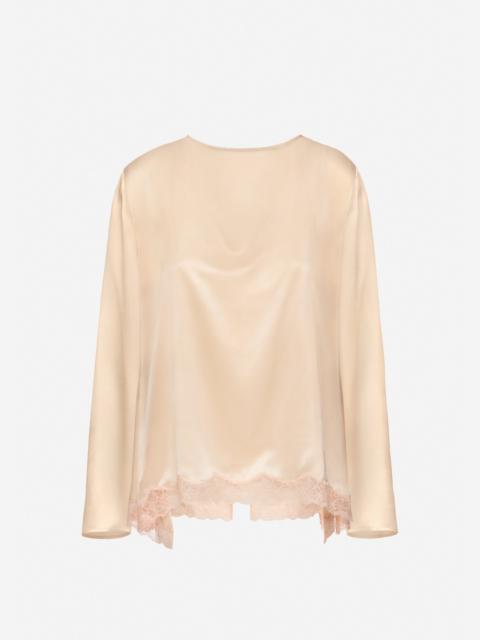 Silk long-sleeve blouse with lace trim in peach