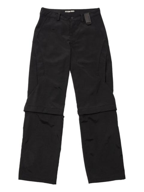 zip-fastening panelled trousers