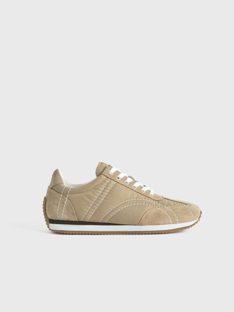 Sport sneakers sand