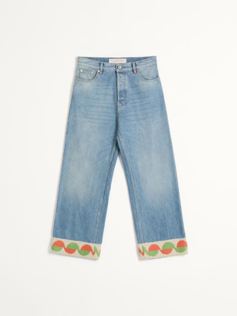 DENIM PANTS WITH JACQUARD HEM