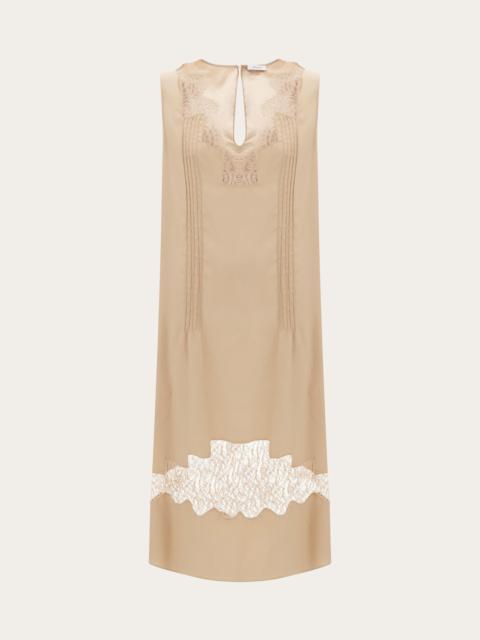 Dress with lace inserts