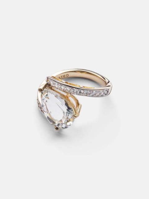 Slanted 14kt gold ring with topaz and diamonds