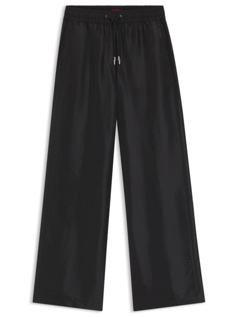 WIDE-LEG RELAXED-FIT TROUSERS WITH DRAWCORD WAIST