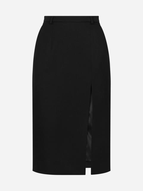 Calf-length wool gabardine skirt with slit