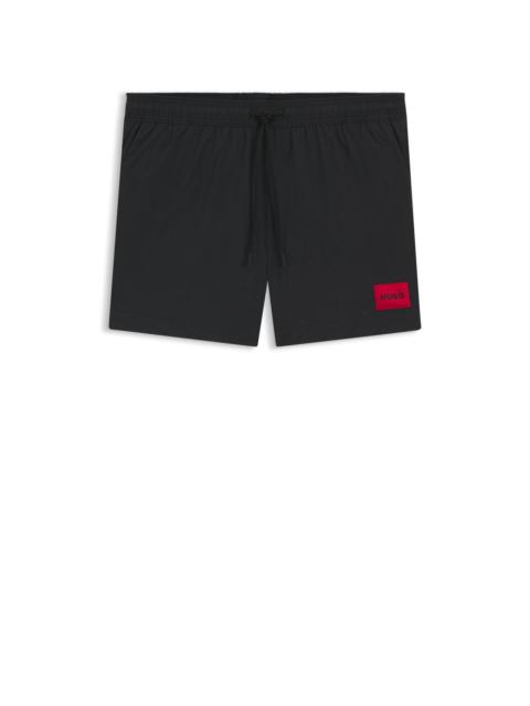 QUICK-DRYING SWIM SHORTS IN RECYCLED MATERIAL WITH LOGO