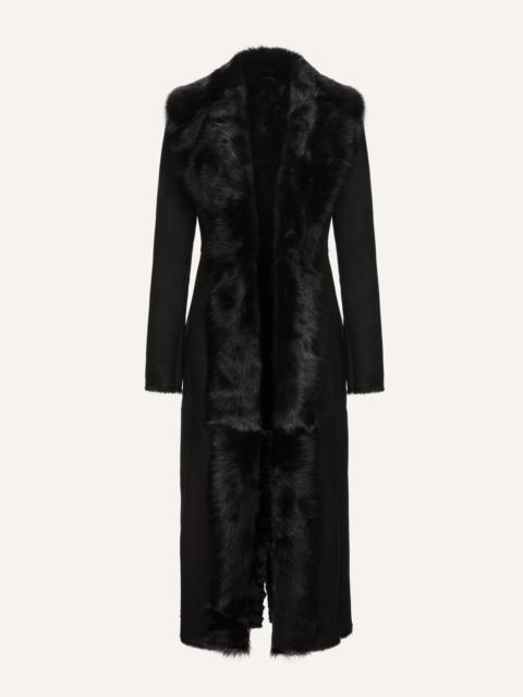 Longline shearling coat in black