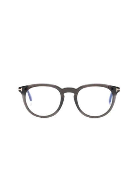 logo-engraved round-frame glasses