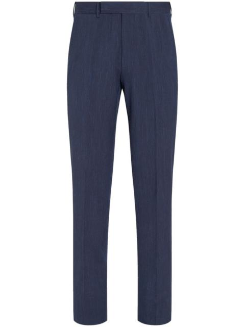 high-waist slim-fit trousers