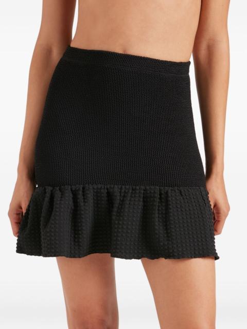 peplum mini skirt
