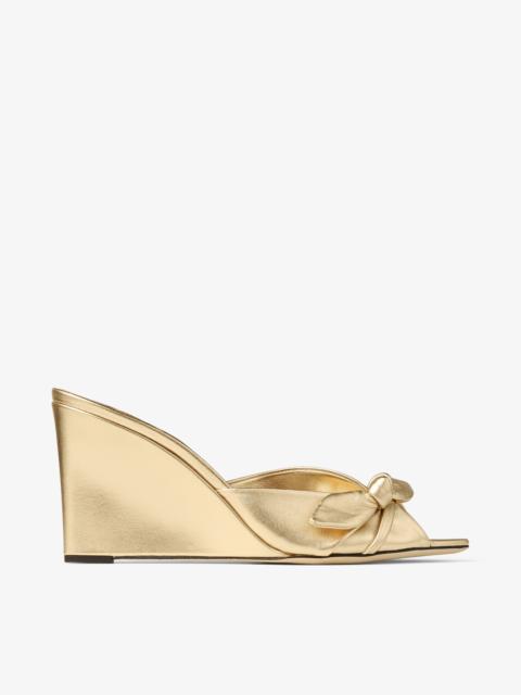 Livi Wedge 85
Gold Metallic Nappa Leather Mules Wedges with Bow