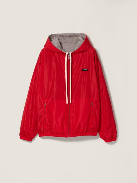 Reversible technical fabric and jersey blouson jacket