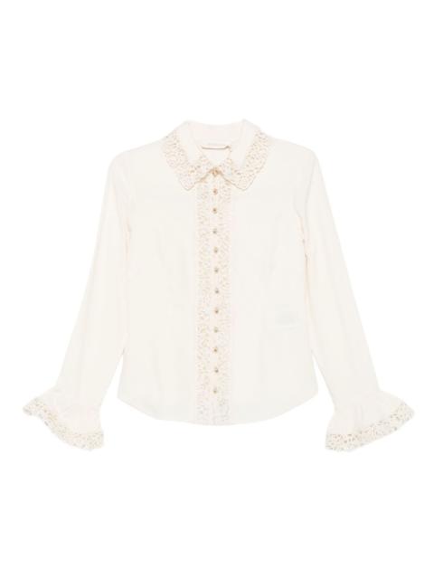 lace-trimmed blouse