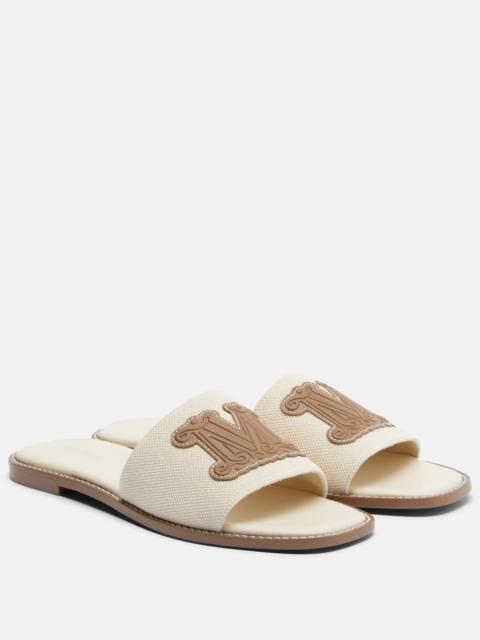 Caucaso leather-trimmed canvas slides