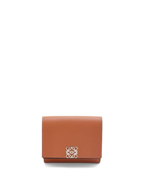 Anagram trifold wallet in pebble grain calfskin