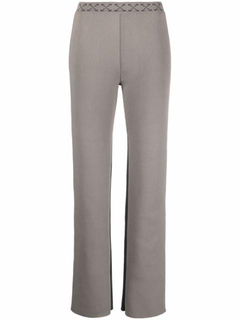 Arrow-waistband trousers