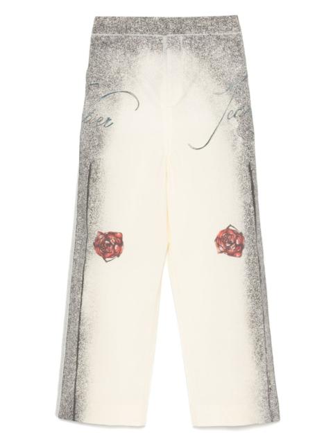multi-tattoo trousers