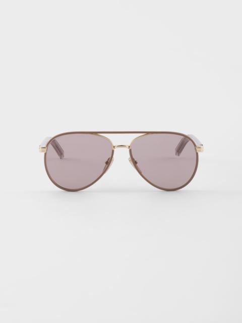 Prada sunglasses with the iconic metal plaque