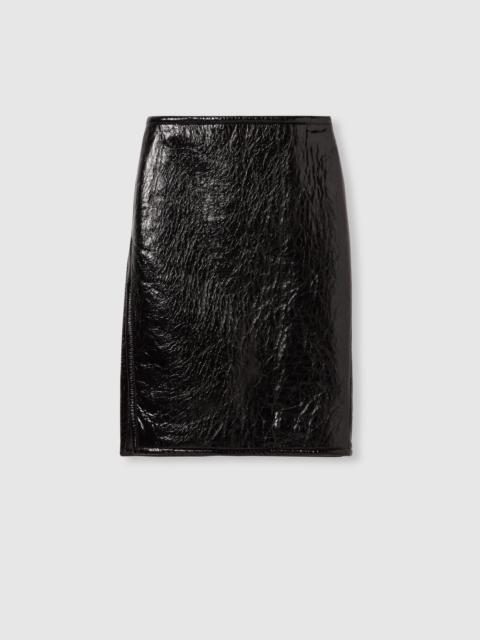 Shiny leather and neoprene skirt