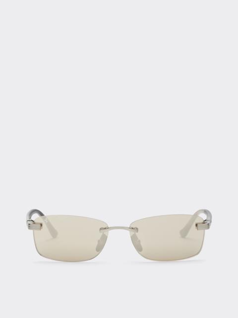 Ferrari sunglasses in  brushed silver-colored titanium  and acetate with transparent gold lenses wit