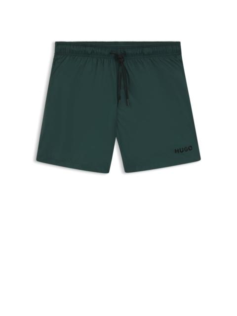 FULLY LINED SWIM SHORTS WITH CONTRAST LOGO