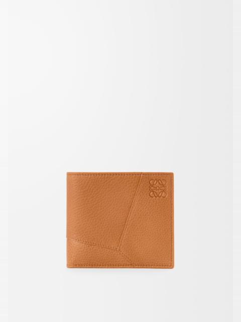 Puzzle bifold wallet in supple grained calfskin