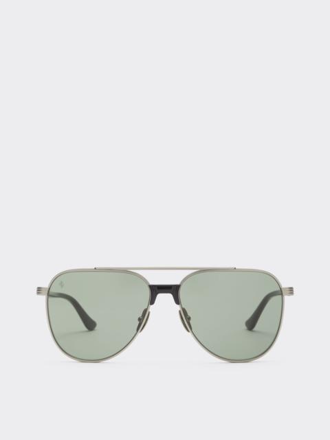 Ferrari sunglasses in  matte silver titanium and acetate with dark green lenses