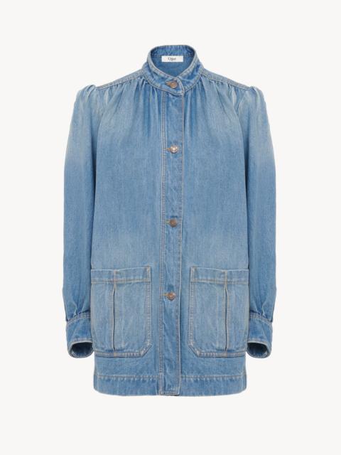 HIGH-NECK GATHERED JACKET IN DENIM