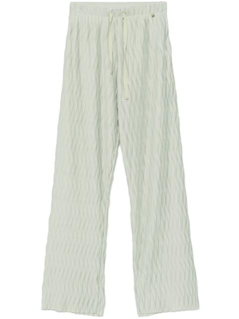 wrinkled-effect trousers