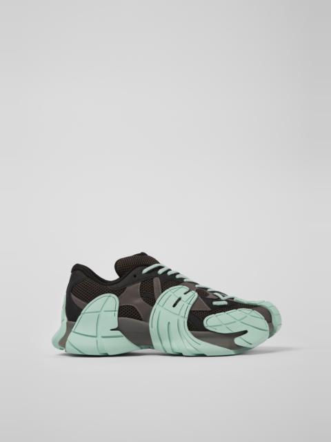 Gray and light green sneakers