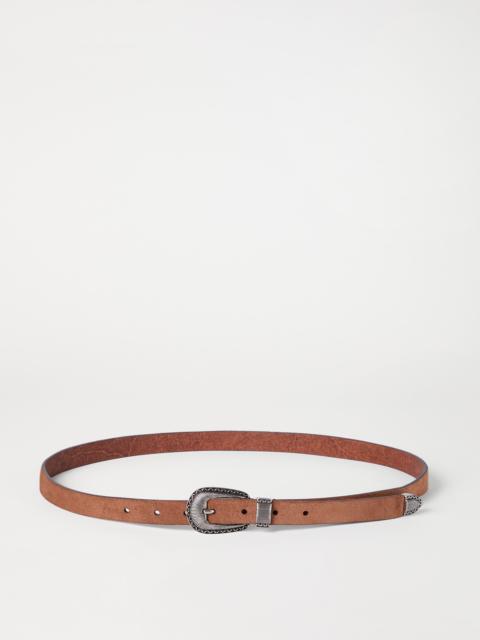Reversed leather belt with tip