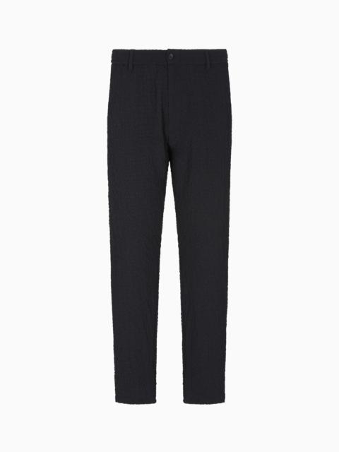 PLEATED TECHNICAL SEERSUCKER FABRIC TROUSERS