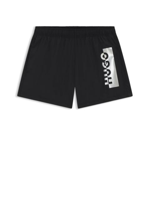 SWIM SHORTS WITH METALLIC SPLIT LOGO
