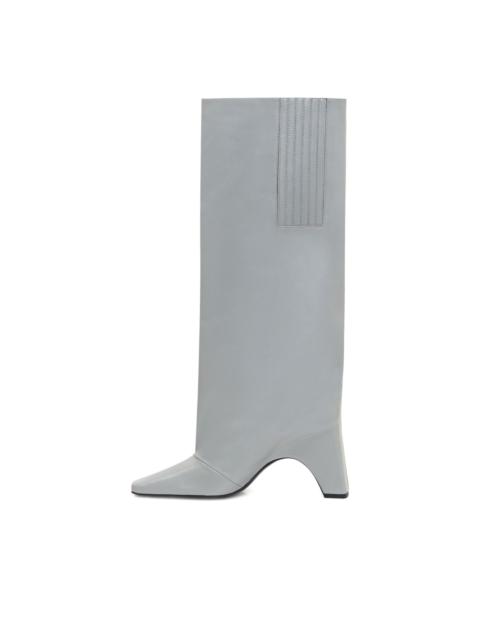 high-heeled thigh-high boots