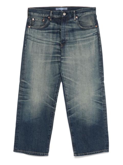 whiskering-effect jeans