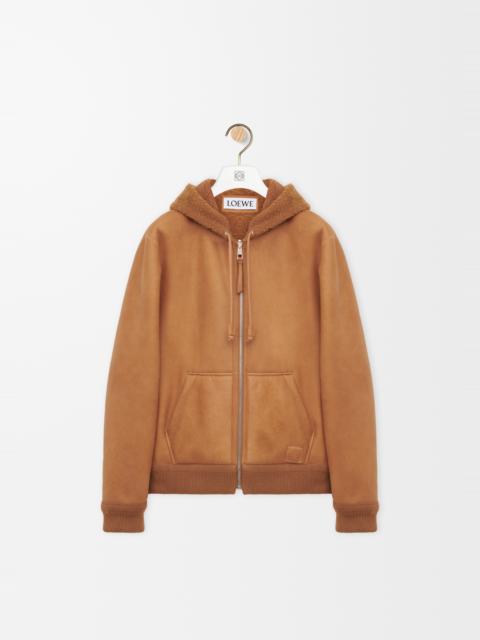 Hooded jacket in shearling