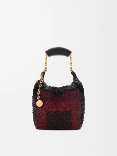 Mini Squeeze bag in beaded leather