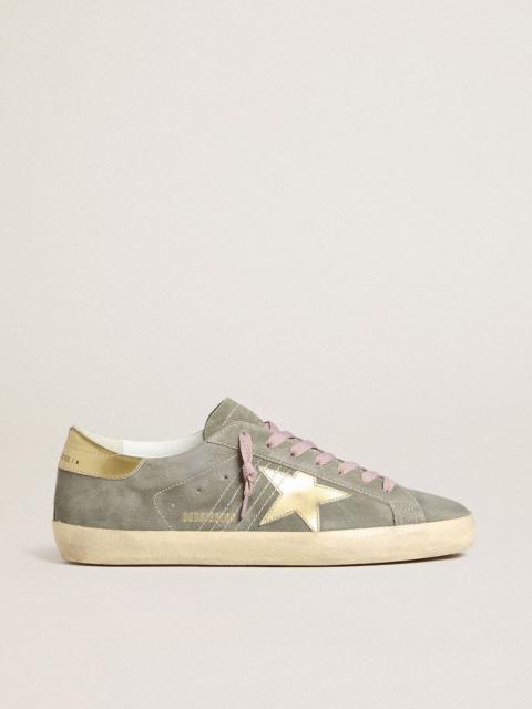 Super-Star in gray suede with gold metallic leather star and heel tab