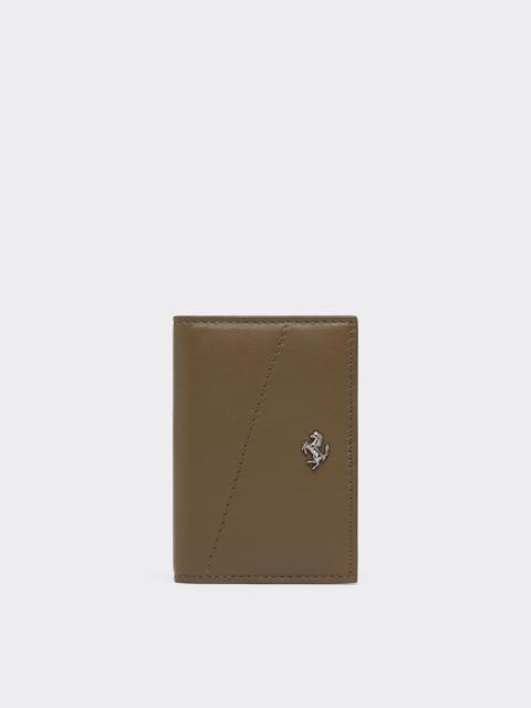 Card holder with smooth leather pocket