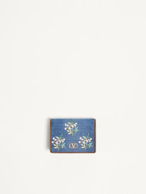 VALENTINO GARAVANI VLOGO SIGNATURE WALLET IN DENIM WITH FLORAL EMBROIDERY