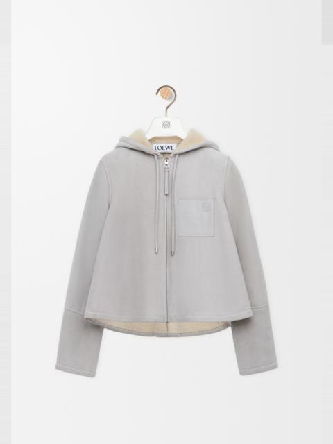 Hooded jacket in shearling