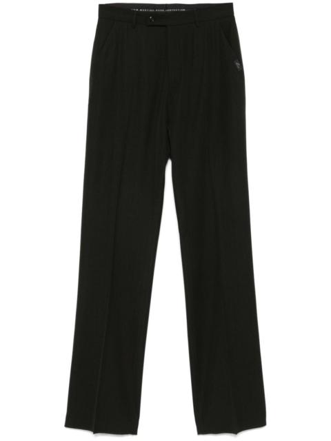 pinstriped tailored trousers