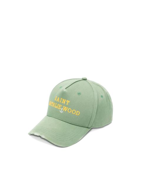 green baseball cap