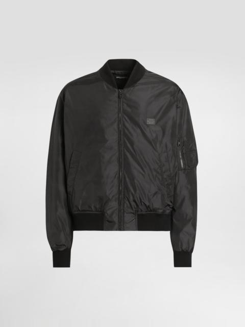 Padded technical fabric bomber jacket with tag